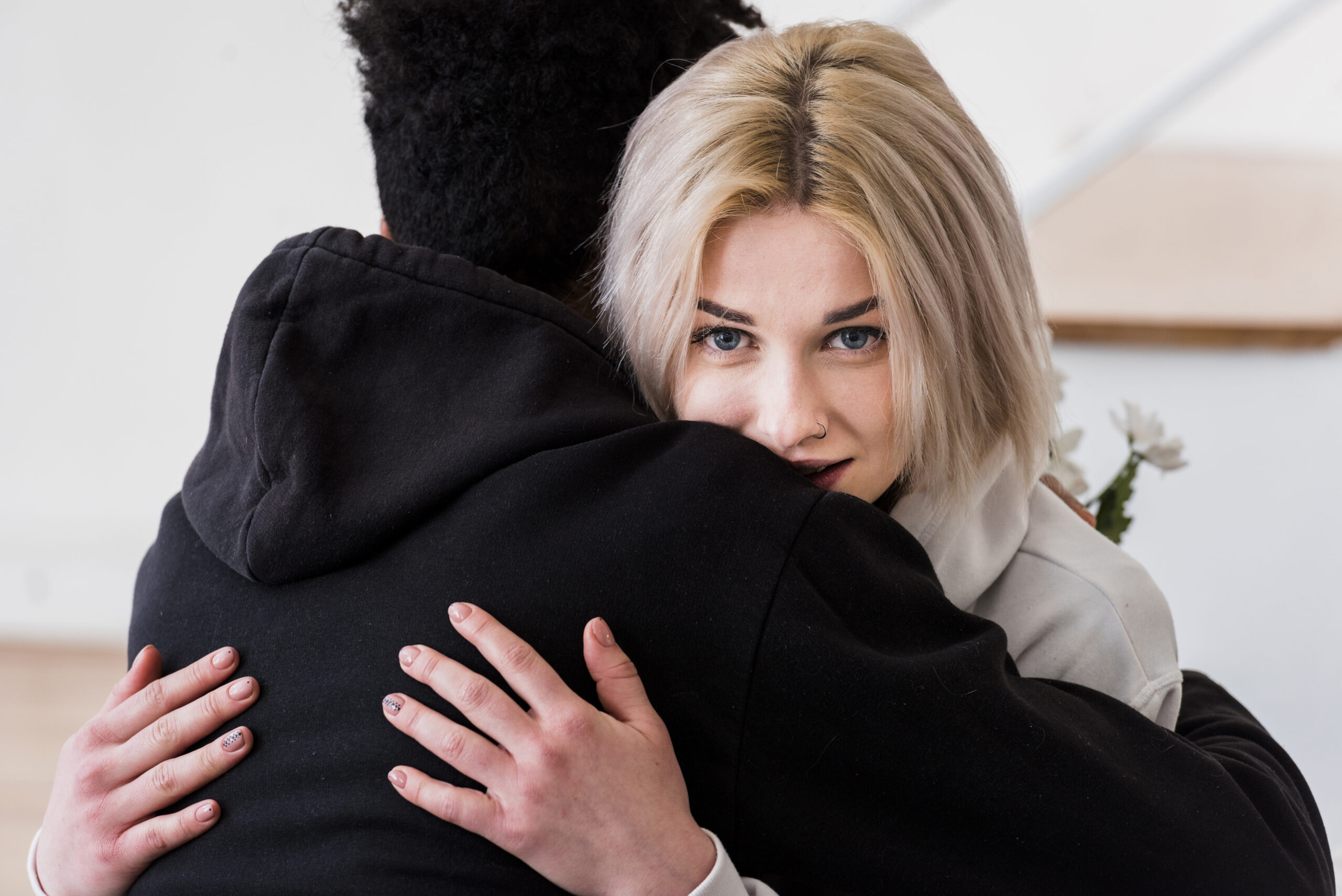 close-up-blonde-young-woman-embracing-her-boyfriend